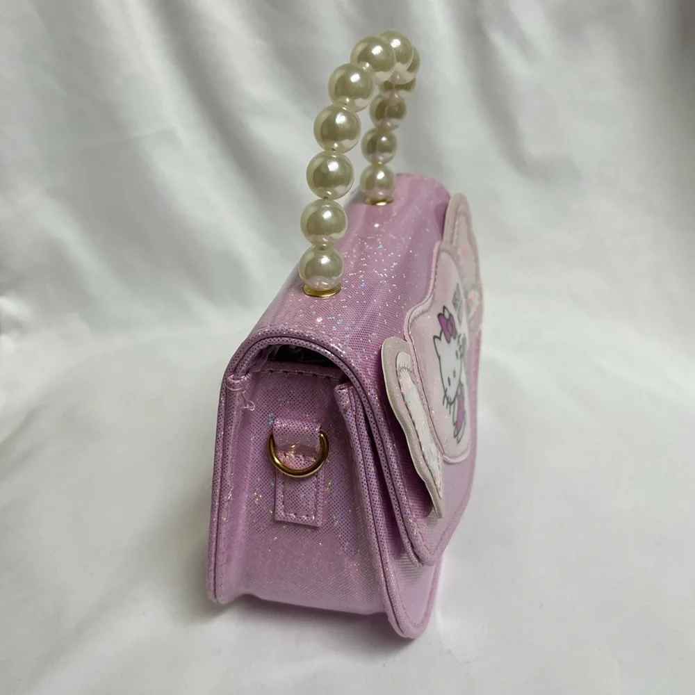 Hello Kitty Pink Glitter Purse, NIB, 6.5 x4.5”, crossbody strap incl, all ages